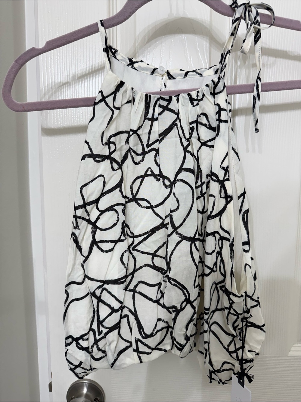 Cecile Sleeveless Halter Top in the "Black Scribble" print by ASTR.